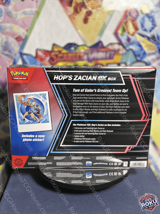 Back of Hop's Zacian EX Box showcasing contents and promotional features in Pokémon TCG.