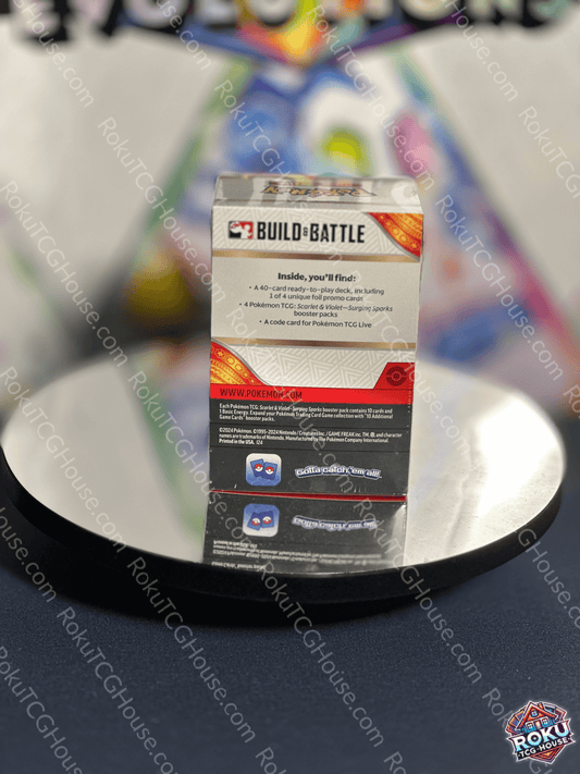 Back of the Surging Sparks Build & Battle Box showing contents and instructions for players.