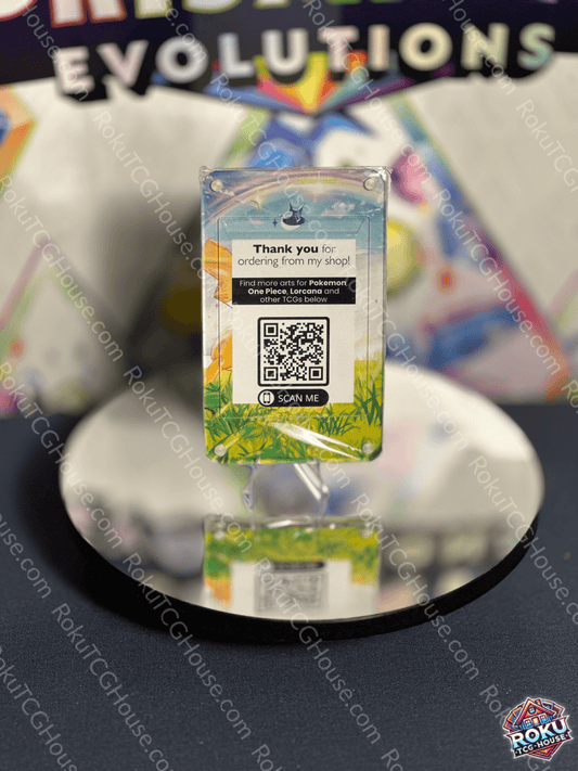 Thank you card displayed in a shop promoting a Pokémon card order with a QR code and colorful design.