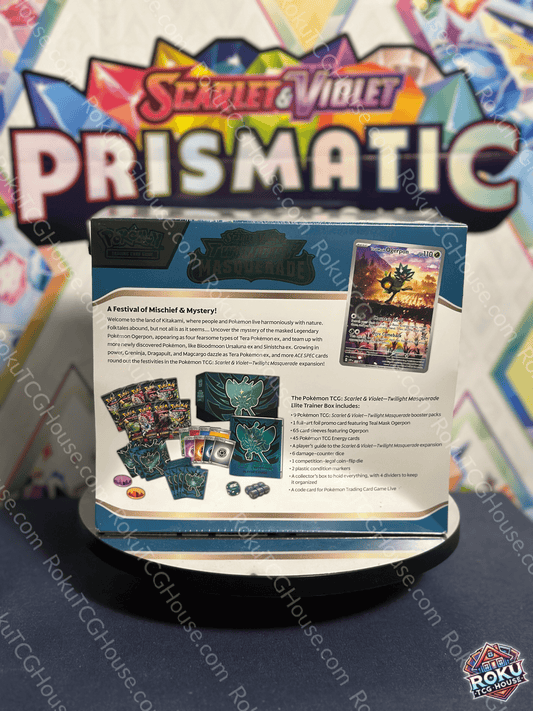 Twilight Masquerade Elite Trainer Box display showcasing cards, accessories, and promotional materials from Pokémon TCG.
