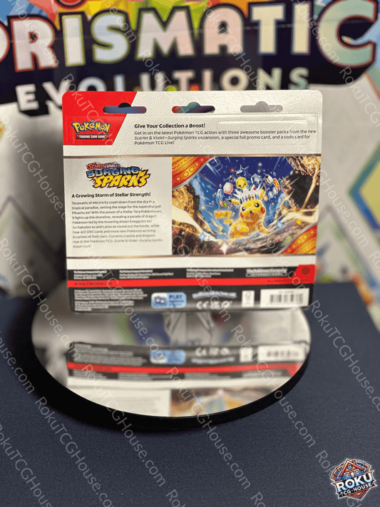 Back of Surging Sparks – 3‑Pack Blister (Zapdos) – Pokémon TCG accessory pack.