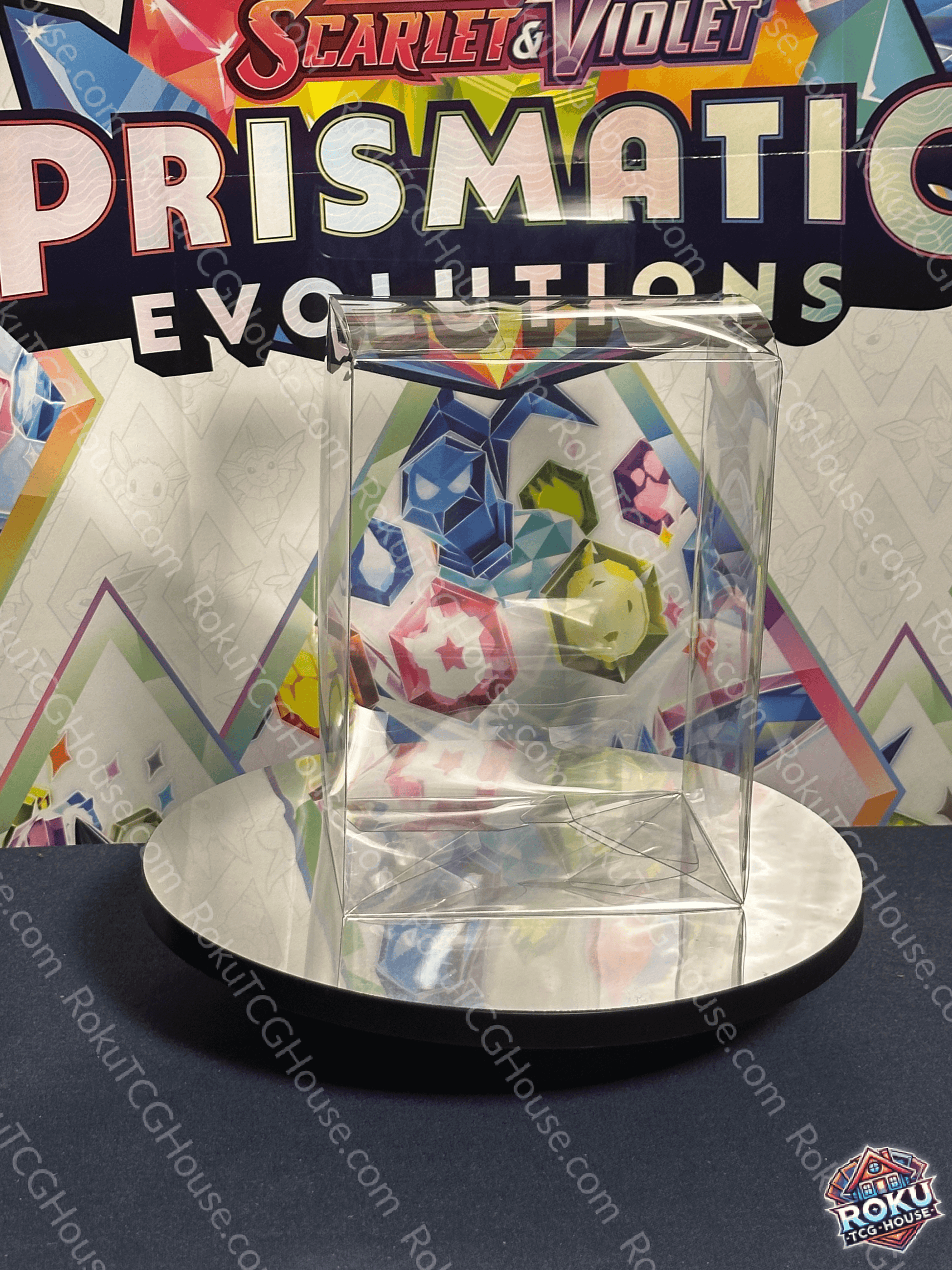 Clear vinyl Funko Pop protector displayed on a circular stand against a colorful promotional backdrop.