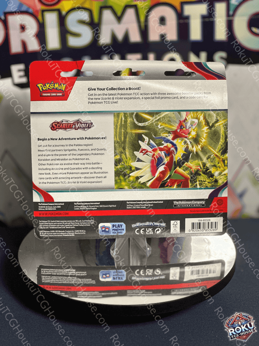 Back of sealed Scarlet & Violet: Base 3‑pack blister showing additional cards, set information, and UPC barcode on the packaging.