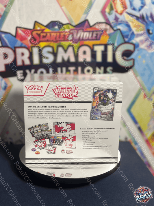 Back of White Flare - Elite Trainer Box displaying contents including booster packs, sleeves, and accessories