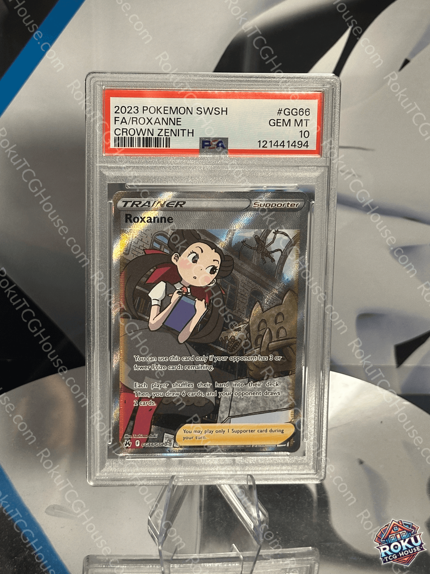 Front of Roxanne Crown Zenith Pokémon card graded PSA 10 in protective PSA case
