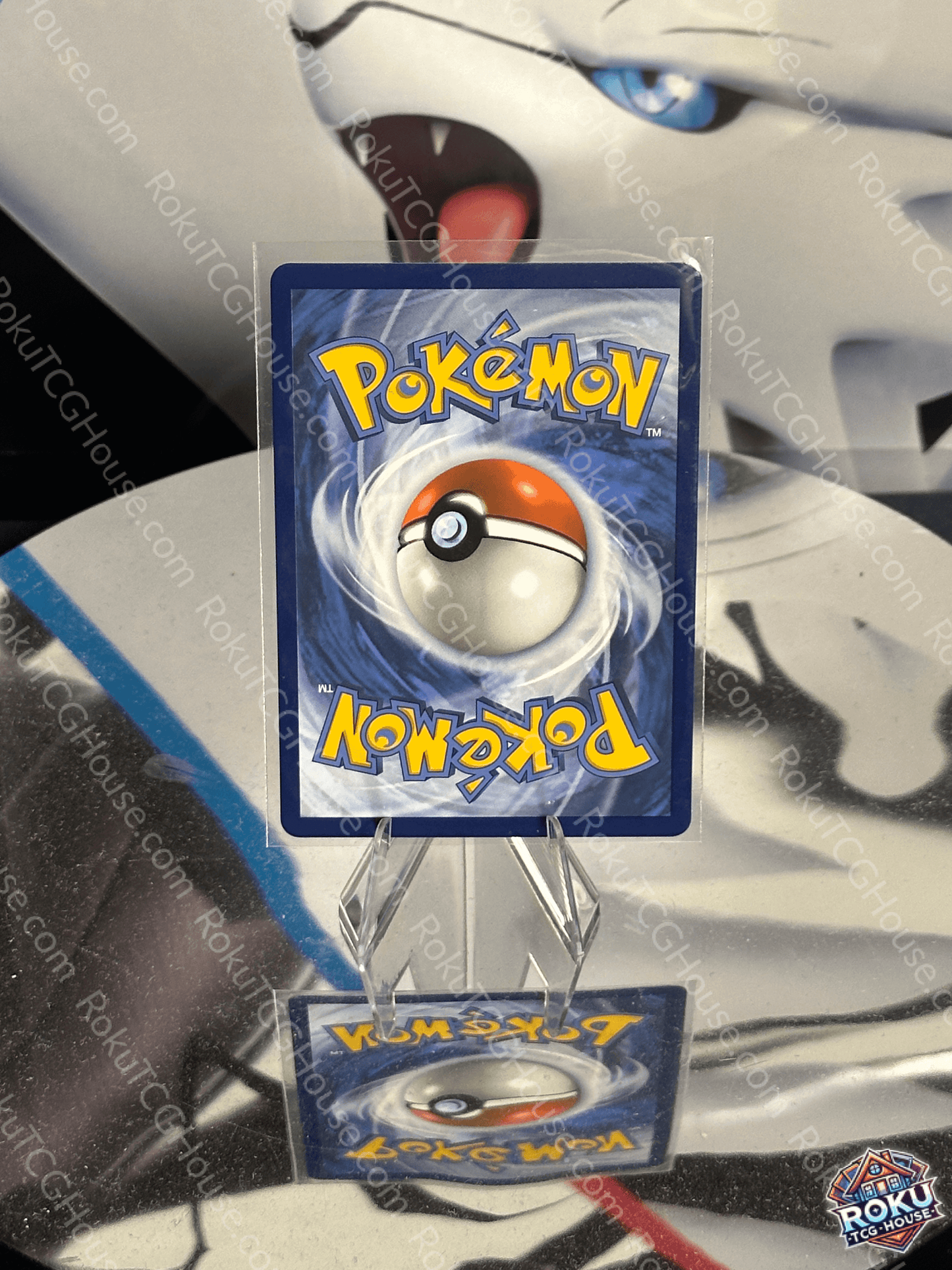Hilda - White Flare Pokémon card shown on display with Poké Ball design, in near mint condition.
