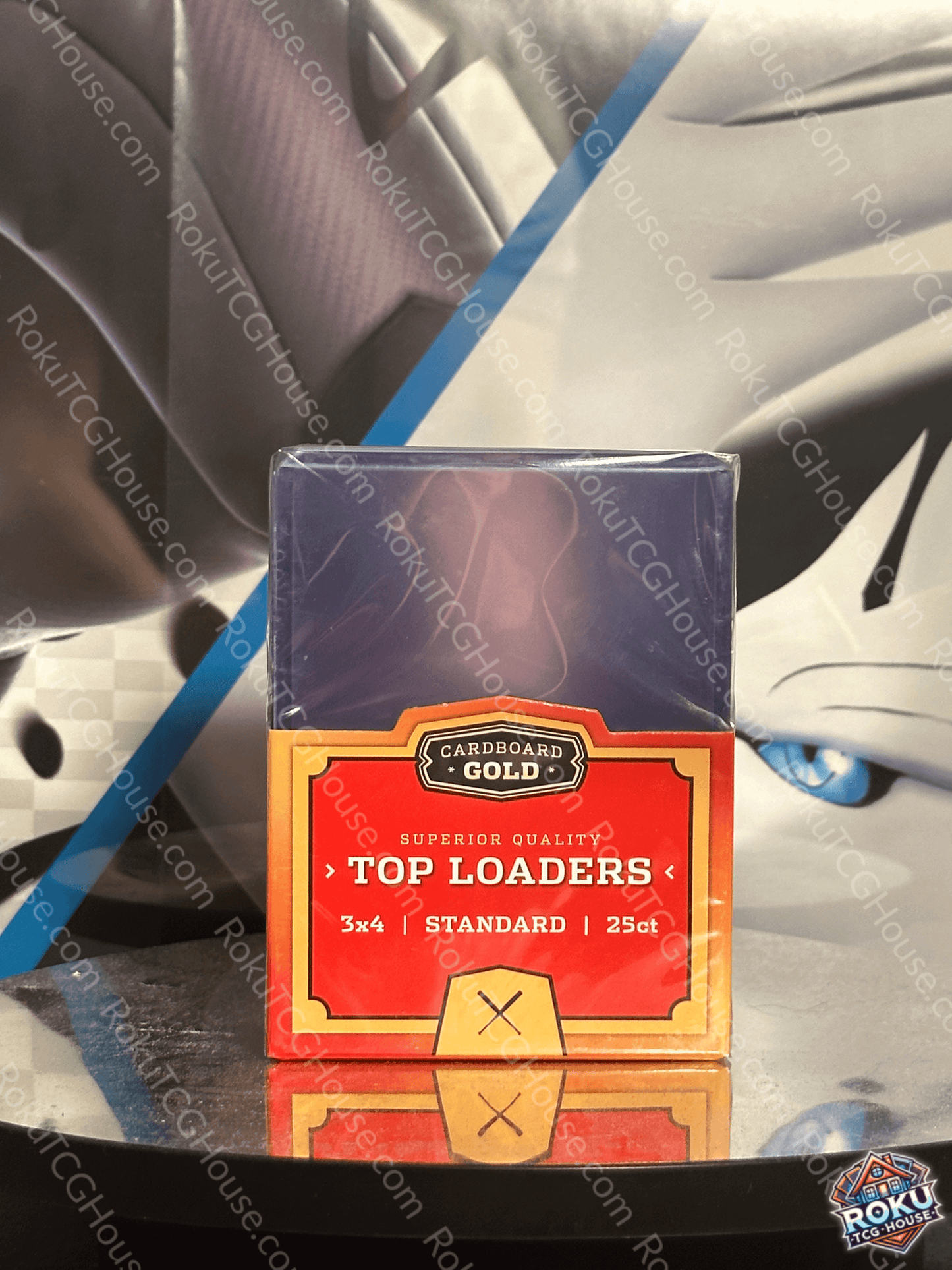 Top Loader Pack (25 Ct.) displayed on a table with a colorful backdrop, highlighting its superior quality.