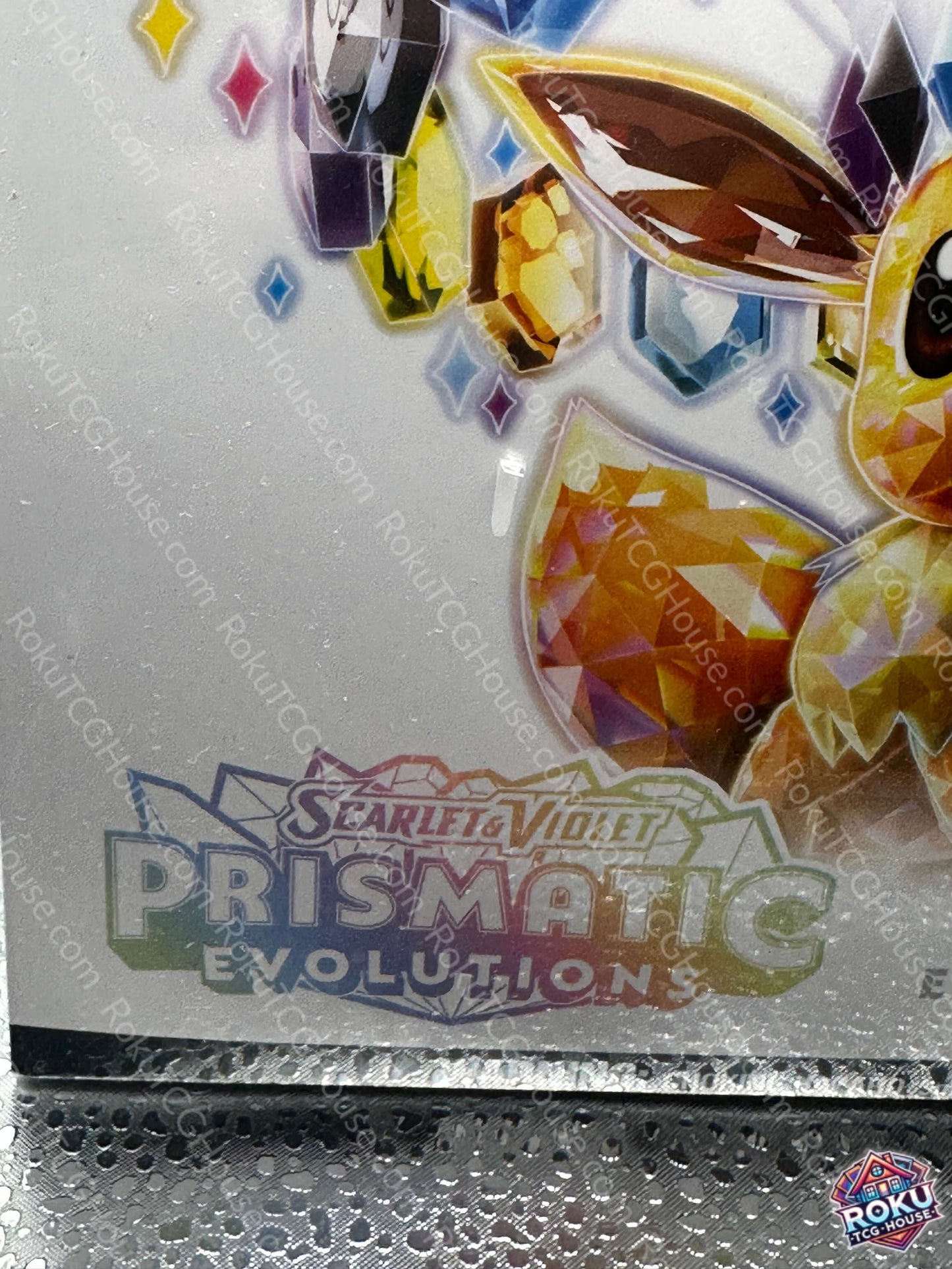 Prismatic Evolutions - Pokemon Center Elite Trainer Box *Small Rip*