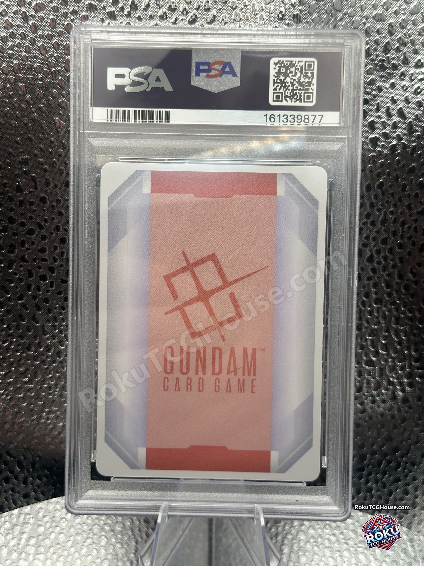 Back of PSA 10 slab showing Gundam Card Game card back and PSA cert 161339877