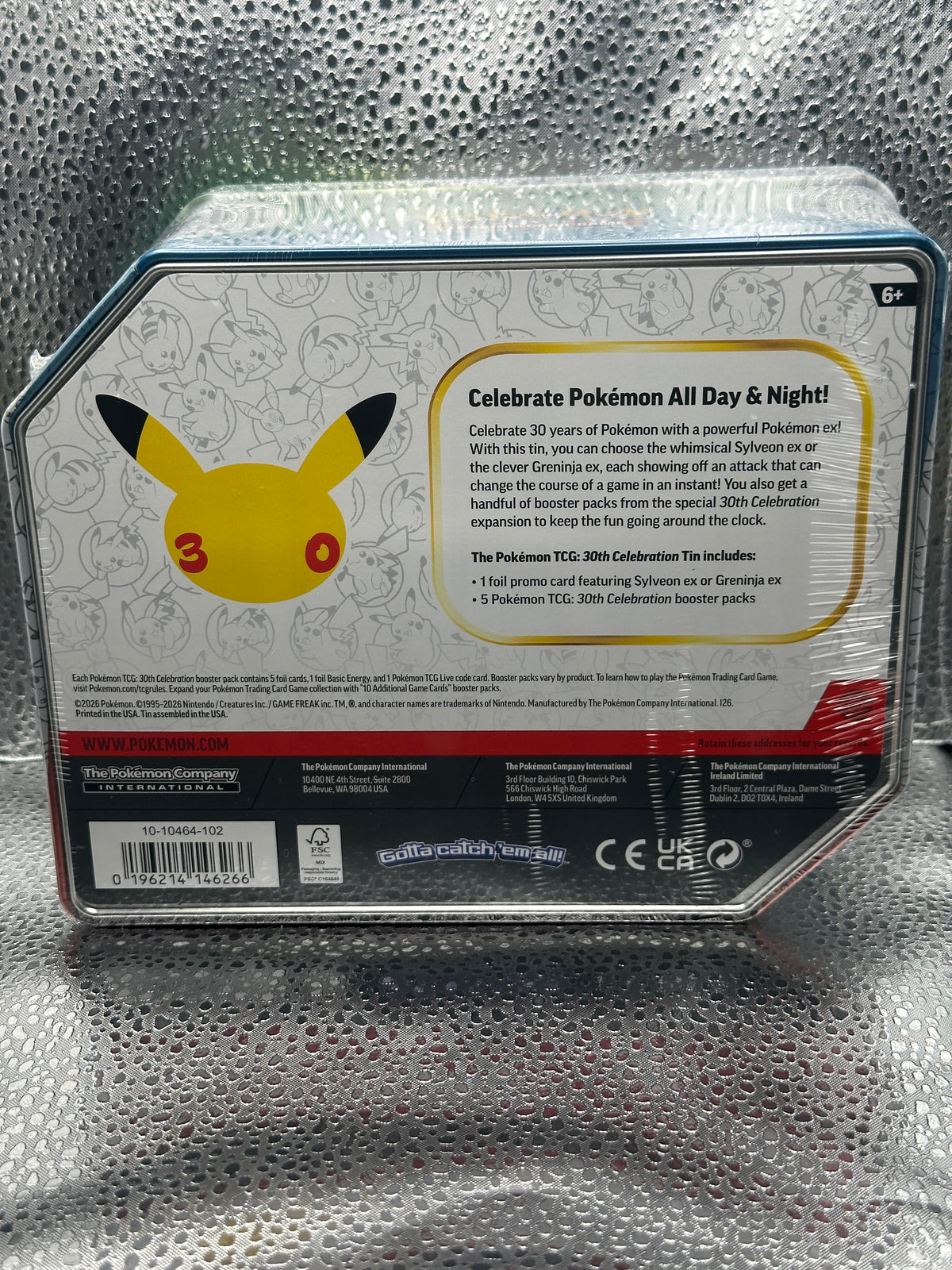 Pokemon TCG 30th Celebration Sylveon ex Tin, back showing contents list