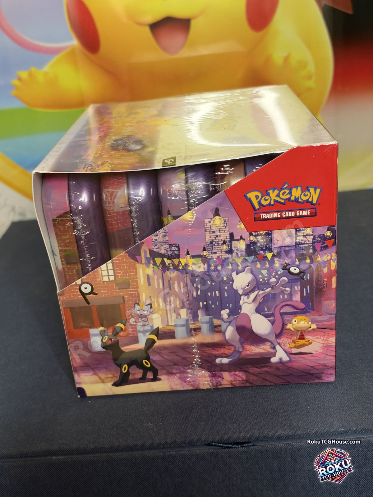 Side of the sealed Pokemon TCG 30th Celebration Mini Tin Display