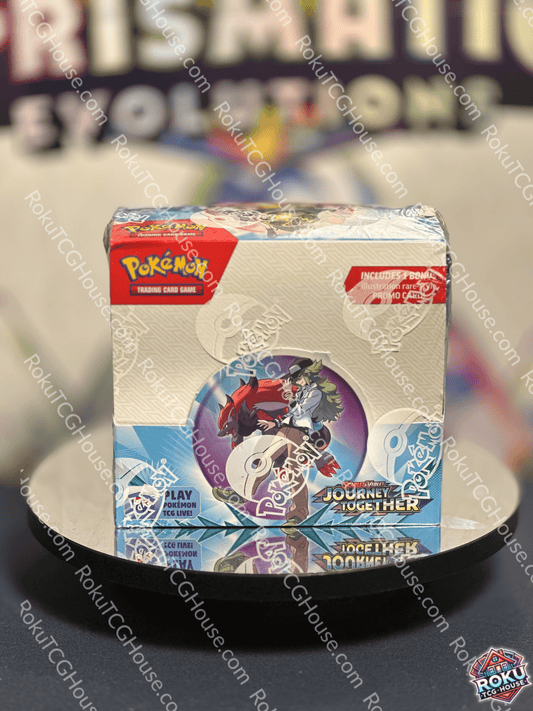 Pokémon Journey Together Booster Box featuring N's Reshiram Promo card on a display plate.