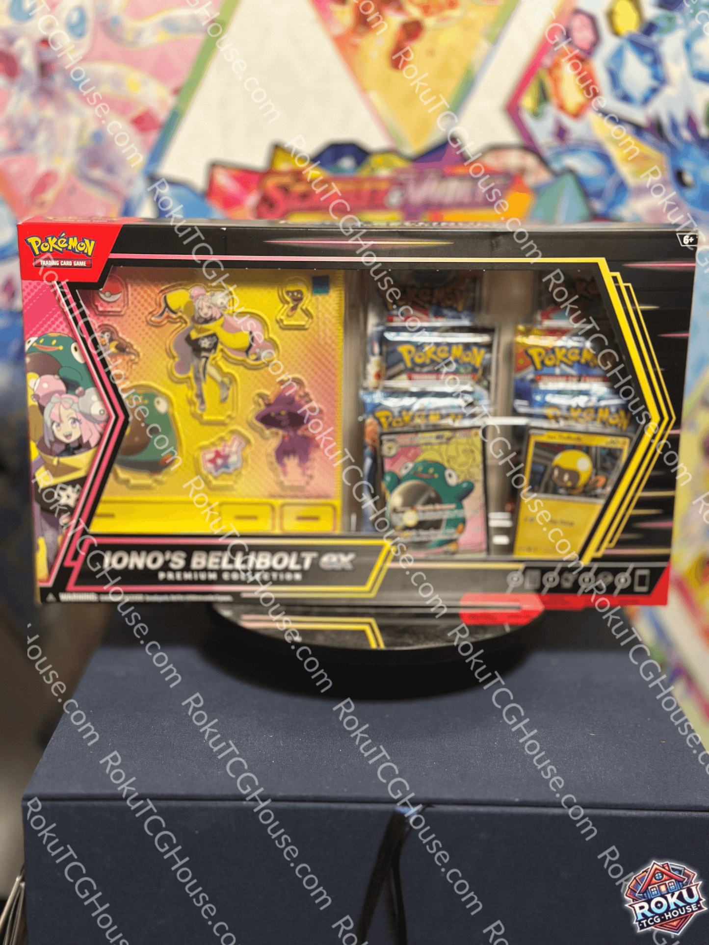 Pokemon TCG Iono's Bellibolt EX Premium Collection box with cards and acrylic standees.