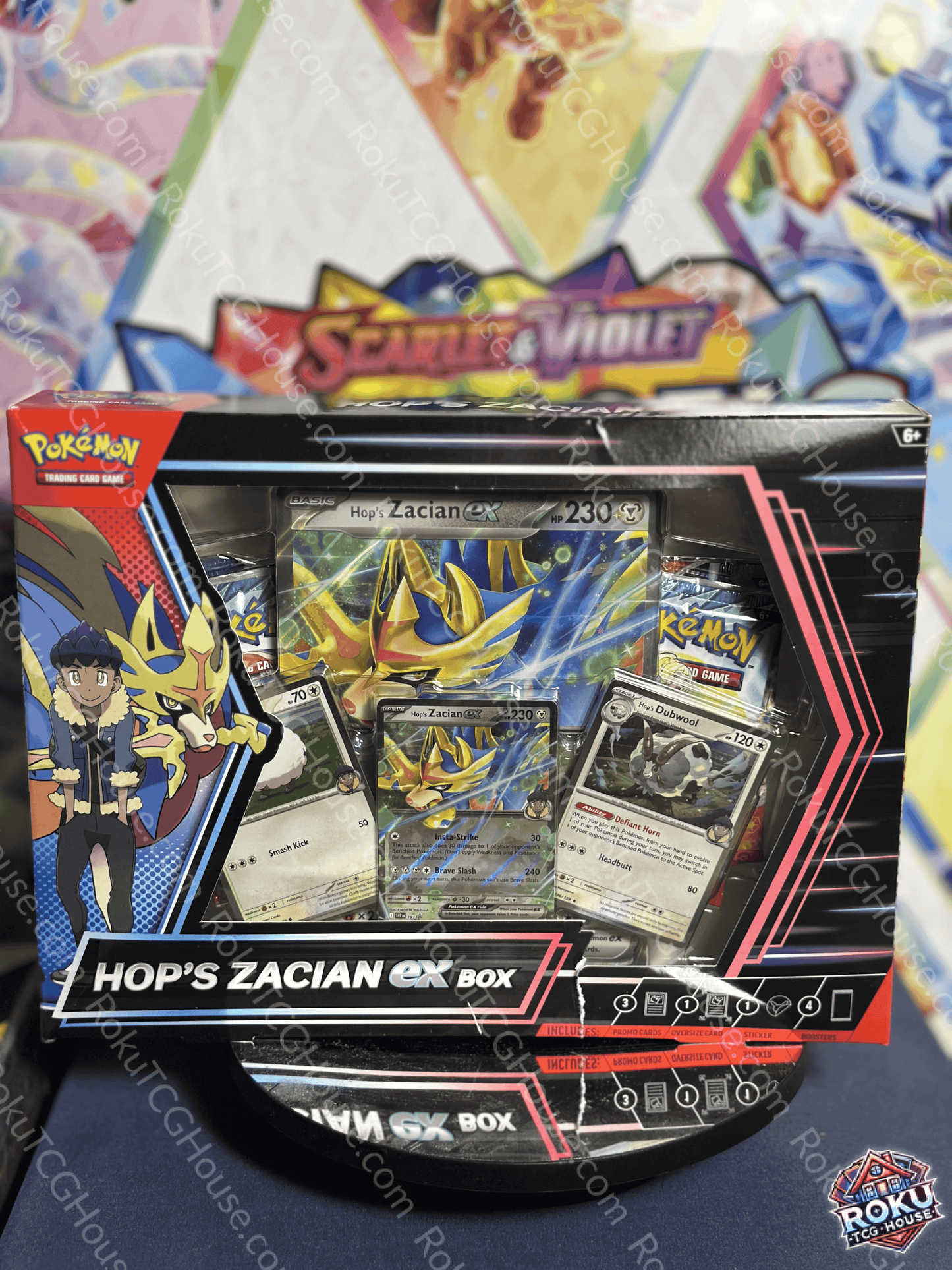 Hop's Zacian EX Box featuring promo cards and booster packs, celebrating the bond of Hop and Zacian in Pokémon TCG.