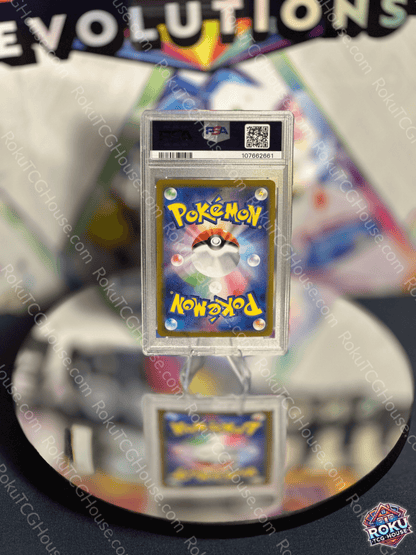 Iron Crown EX Pokémon card displayed in PSA 9 grade with striking blue background, reflecting collectible elegance.