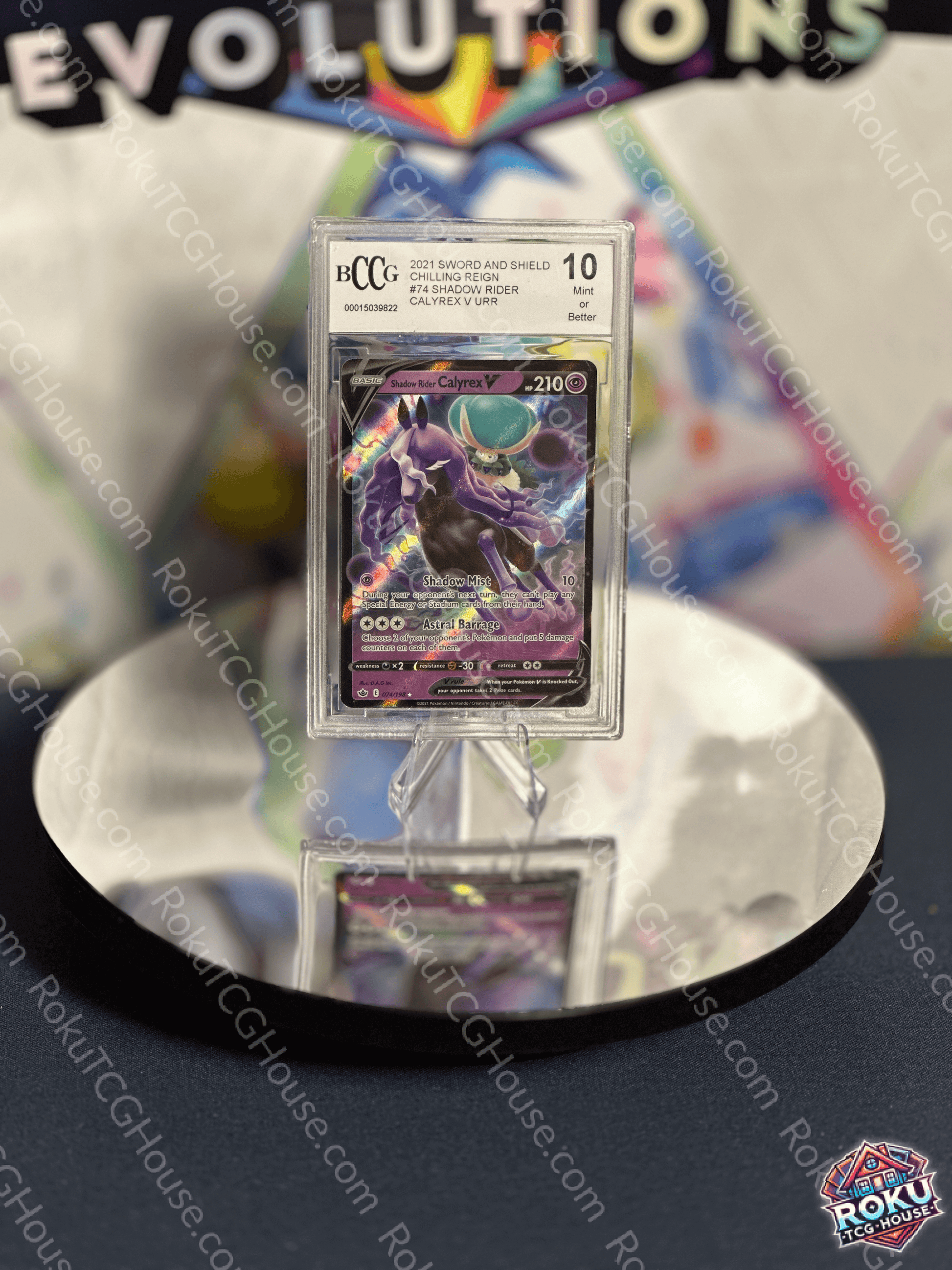 Shadow Rider Calyrex V Pokemon card BCCG 10 from Chilling Reign displayed on a reflective surface.