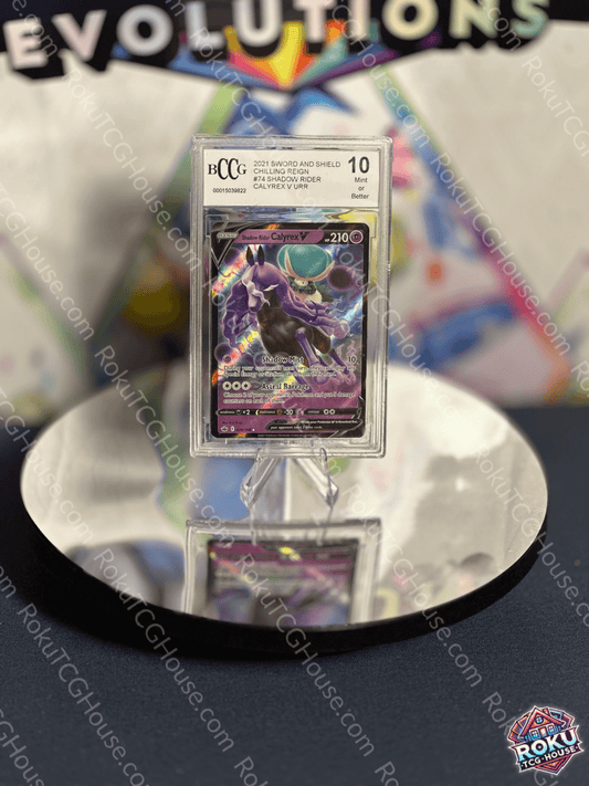 Shadow Rider Calyrex V Pokemon card BCCG 10 from Chilling Reign displayed on a reflective surface.