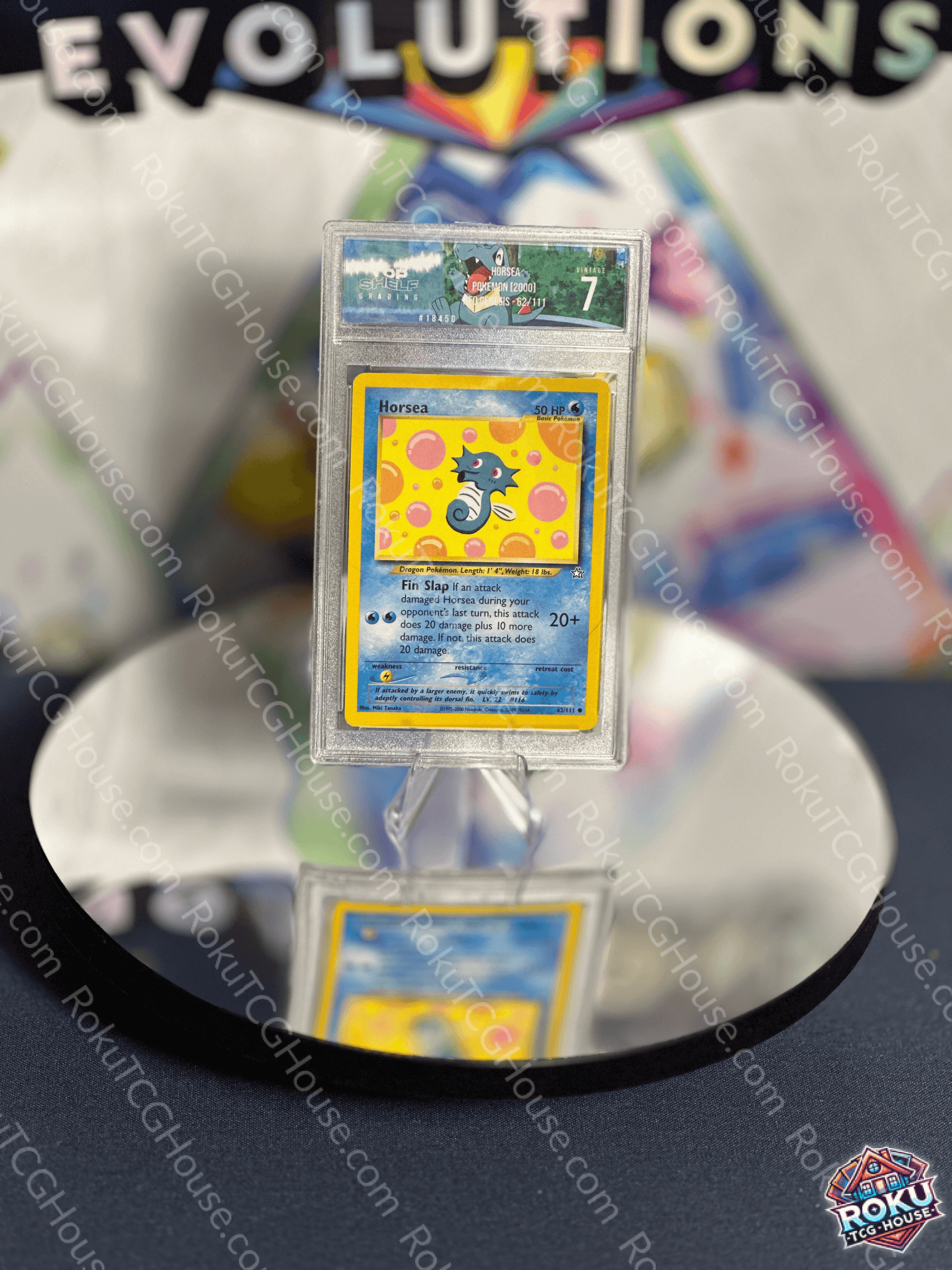 Horsea Neo Genesis Pokémon card graded TSG 7, featuring vintage artwork on a reflective display.