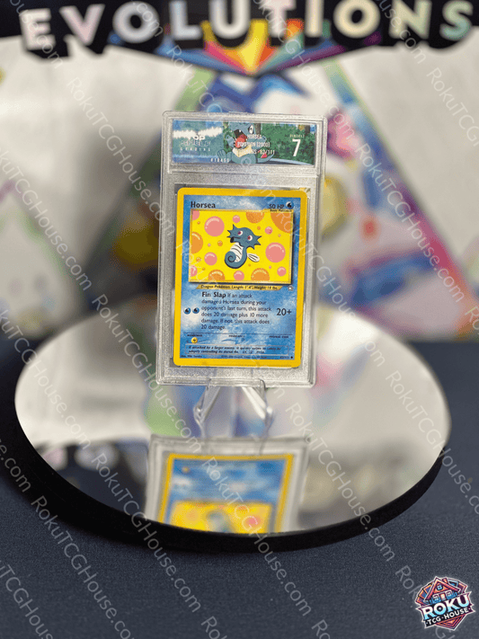 Horsea Neo Genesis Pokémon card graded TSG 7, featuring vintage artwork on a reflective display.