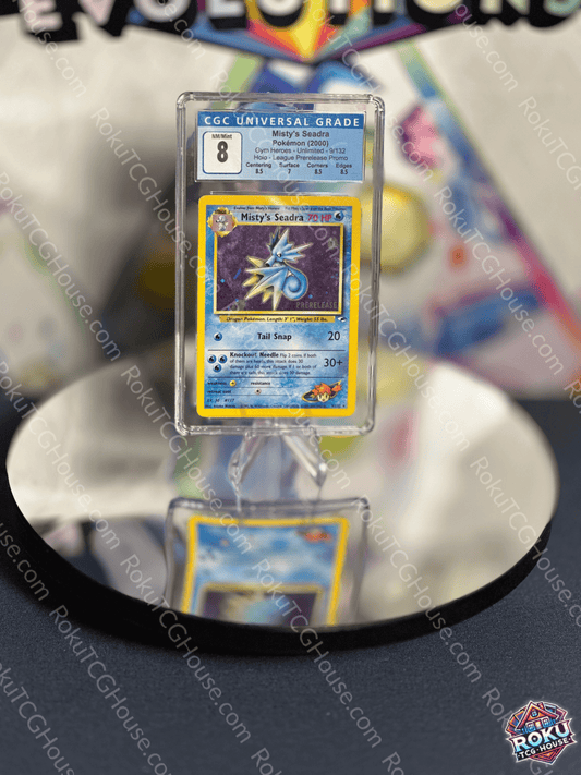Misty's Seadra Pokemon card graded CGC 8, featuring stunning artwork and details of the Prerelease Promo.