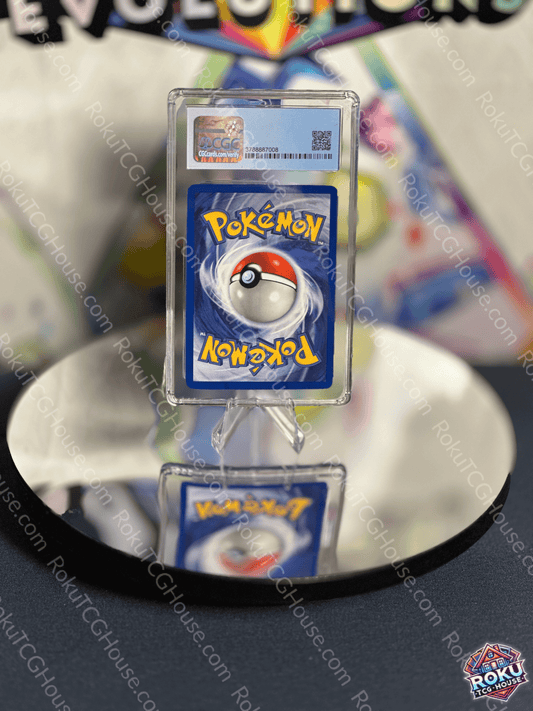 Misty's Seadra Pokémon card displayed in protective case, graded CGC 8 with reflective mirror background.