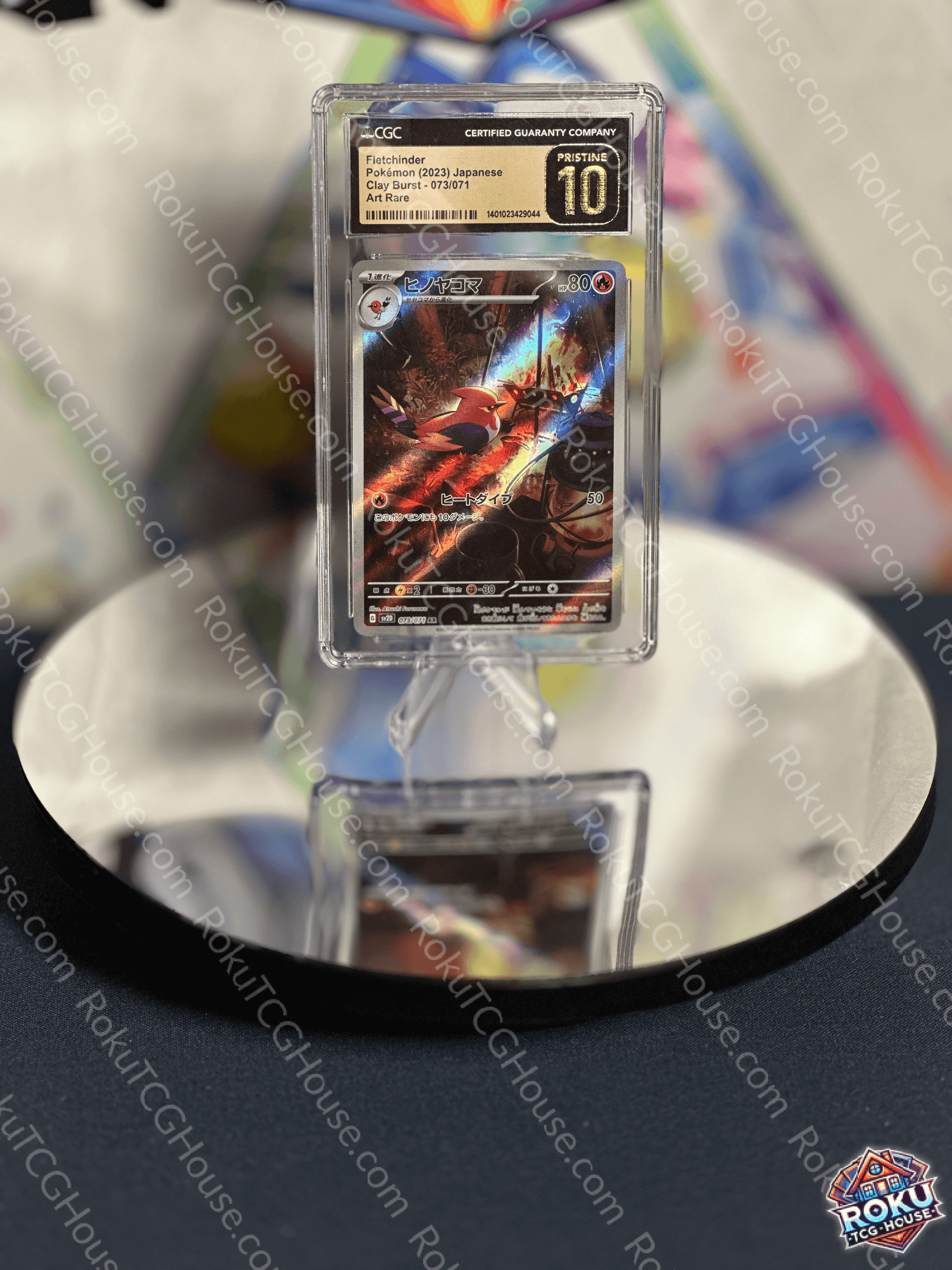 Fletchinder Clay Burst Pokémon card graded CGC Pristine 10 displayed on a mirror stand.