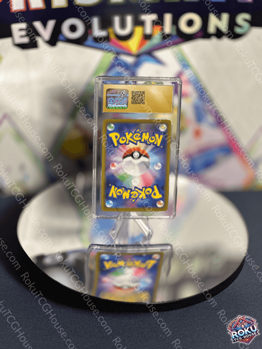 Fletchinder Pokémon card from Clay Burst set displayed on a reflective surface with vibrant colors and CGC grade.