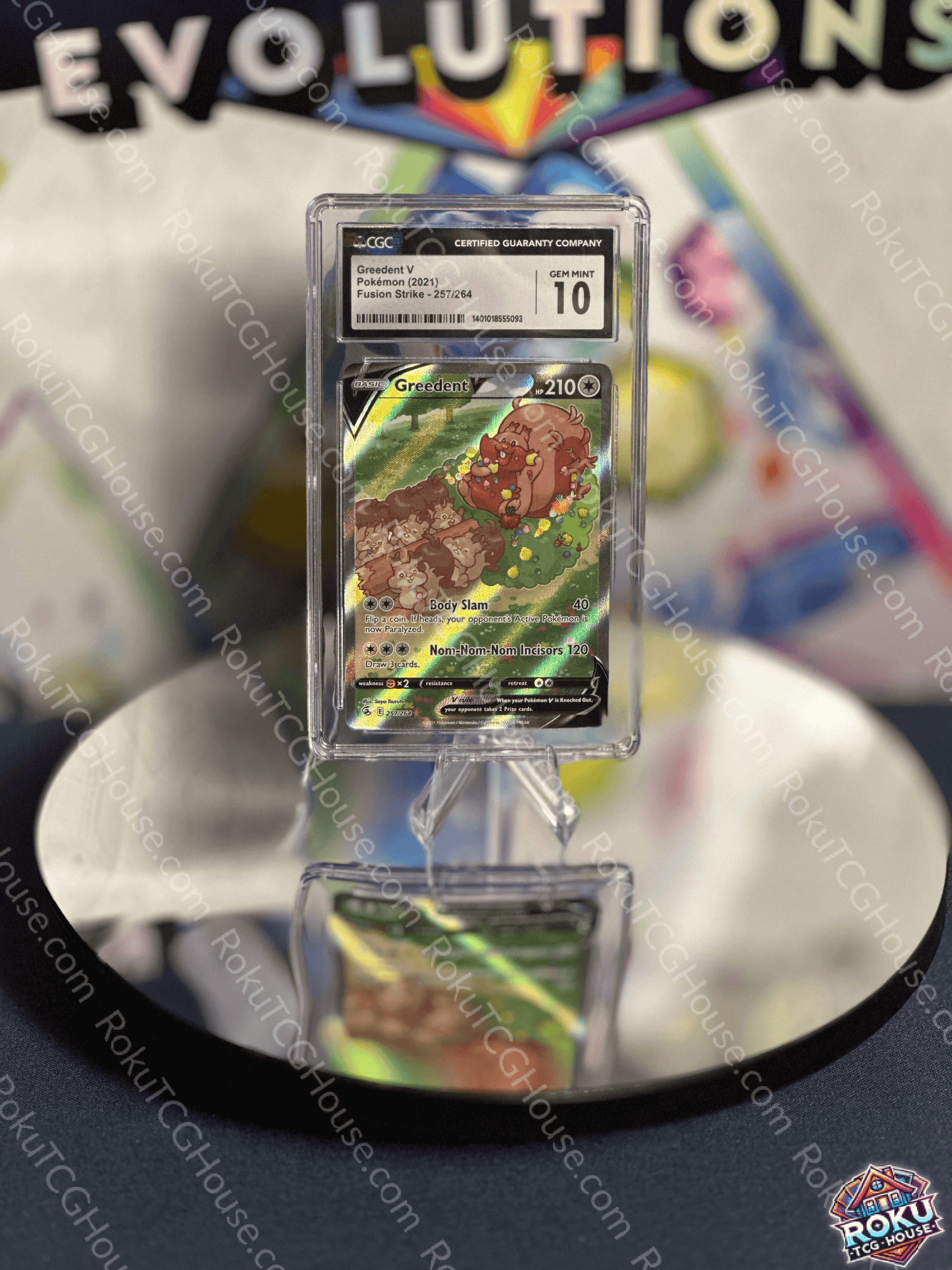Greedent V Pokemon card from Fusion Strike set graded CGC 10 displayed on a reflective surface.