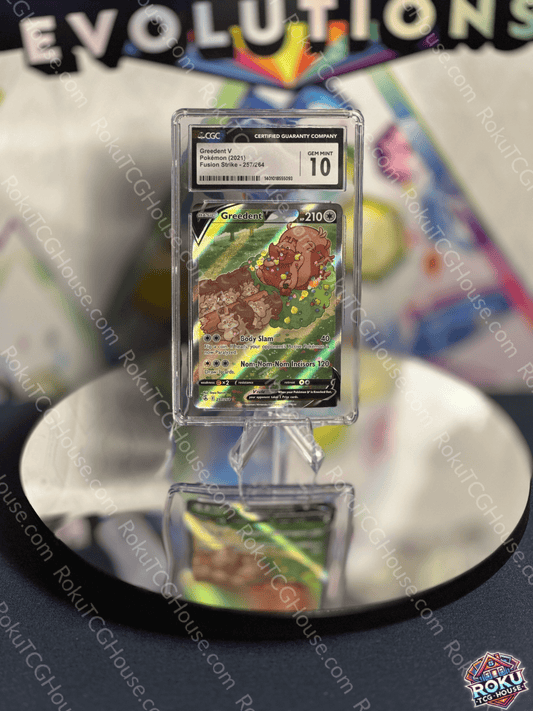 Greedent V Pokemon card from Fusion Strike set graded CGC 10 displayed on a reflective surface.