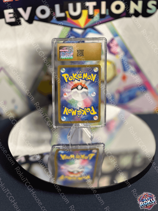 Pokémon card displayed on a mirrored surface, showcasing vibrant artwork from the Evolutions series.