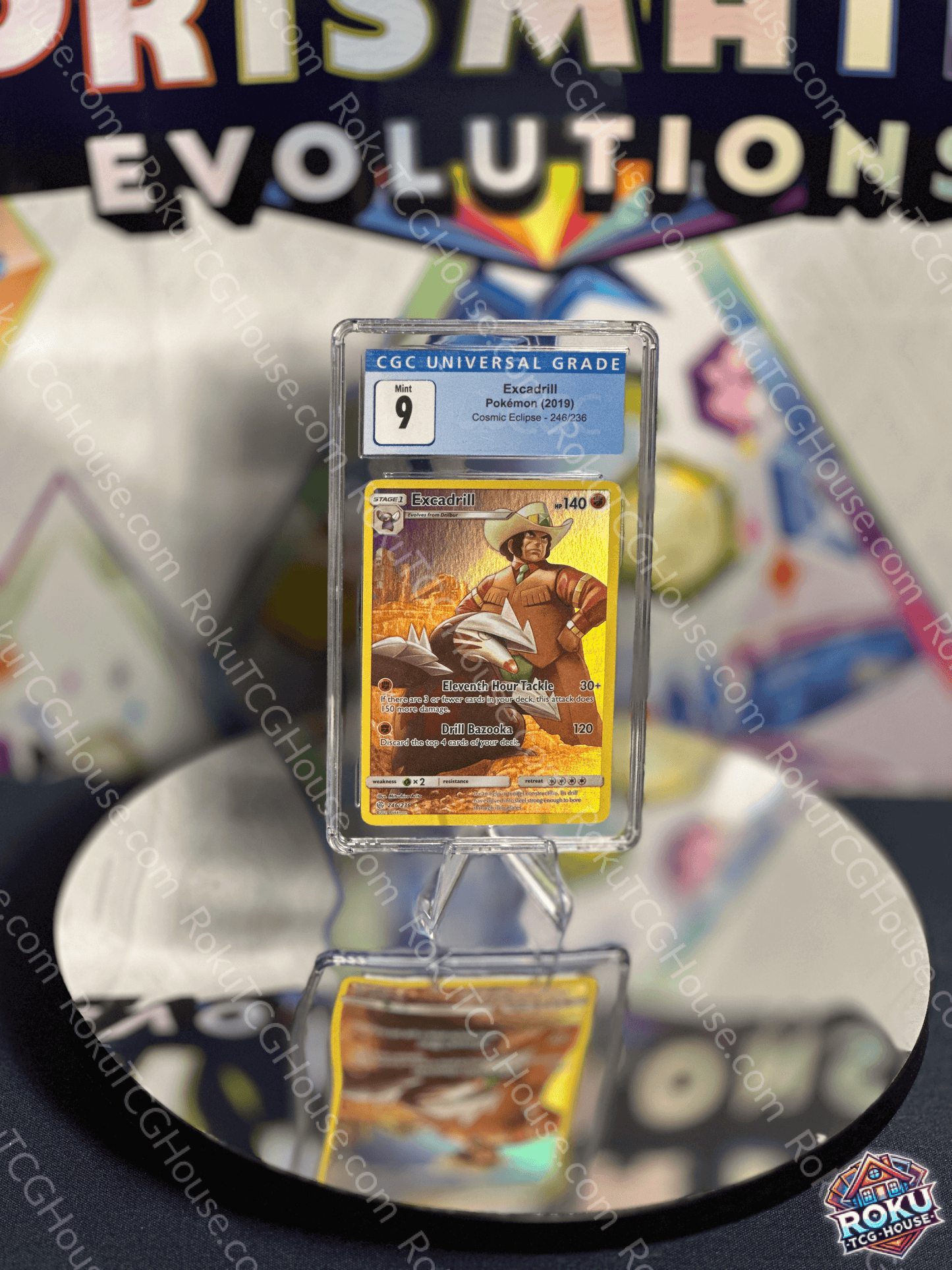 Excadrill Cosmic Eclipse Pokemon card graded CGC 9, displayed on a reflective surface.