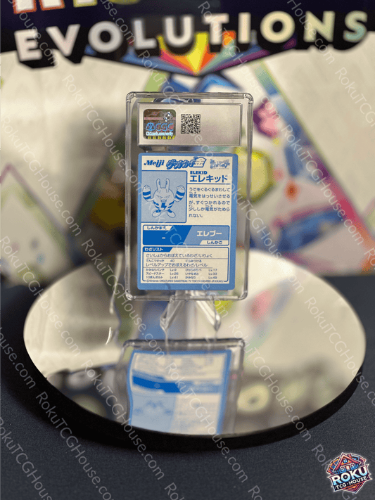 Elekid Meiji Gold Foil Pokémon card displayed on a reflective surface, showcasing unique design and grading.