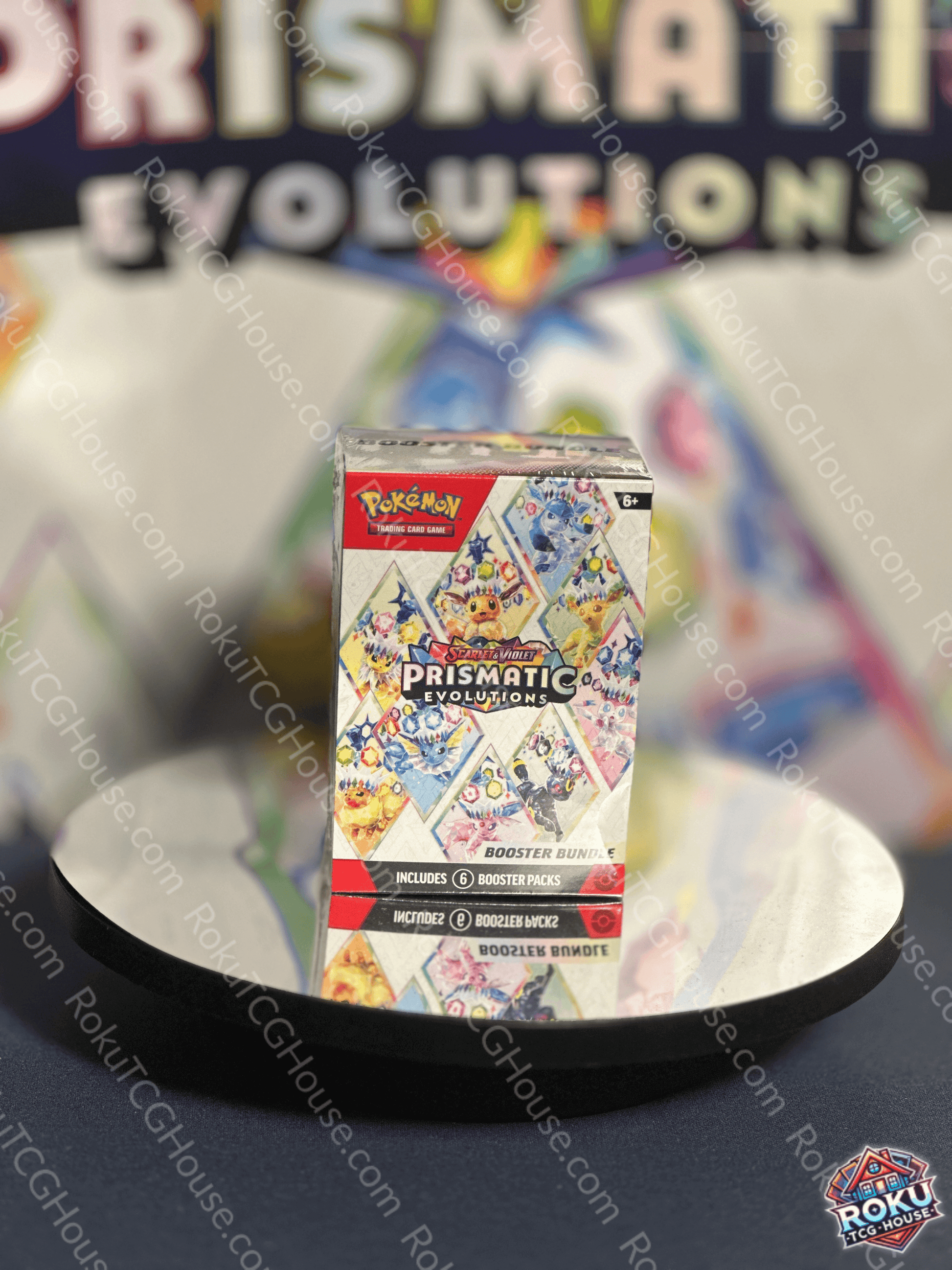 Front of Prismatic Evolutions – Pokémon TCG Booster Bundle.