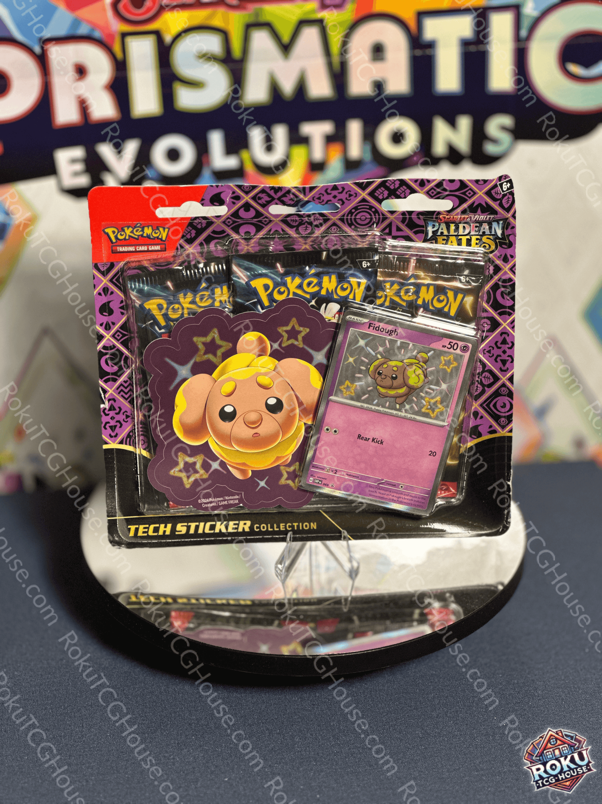 Front of Paldean Fates Tech Sticker Collection (Fidough) – Pokémon TCG sticker accessory.