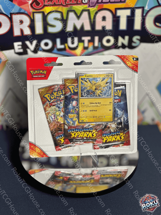 Front of Surging Sparks – 3‑Pack Blister (Zapdos) – Pokémon TCG accessory pack.