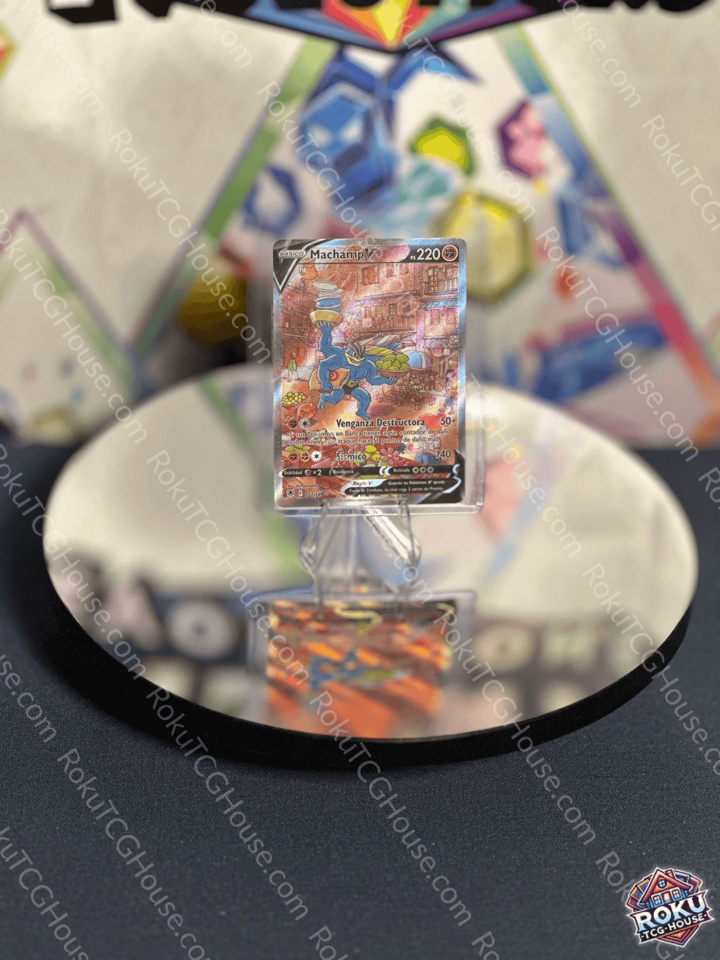Machamp V card from Astral Radiance set displayed on reflective surface, showcasing dynamic Fighting-type artwork.
