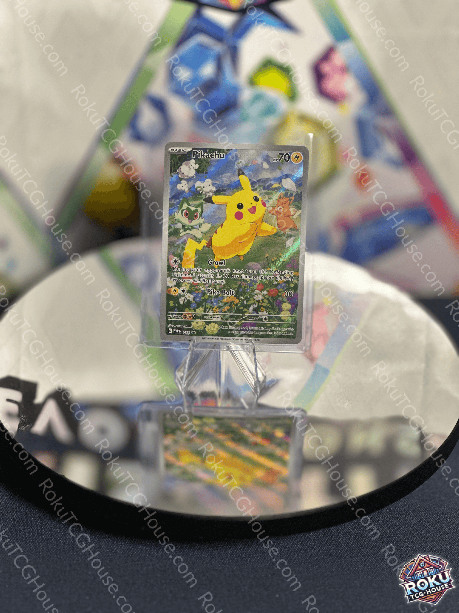 Pikachu Pokemon card displayed on a stand, featuring vibrant artwork and colors, ideal for collectors.