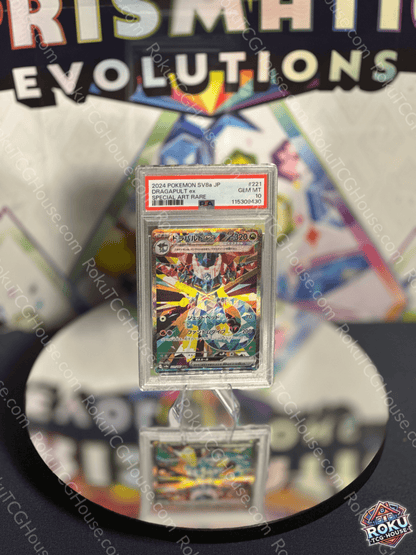 Dragapult EX Terastal Festival Pokémon card in PSA 10 grade displayed on a reflective surface.
