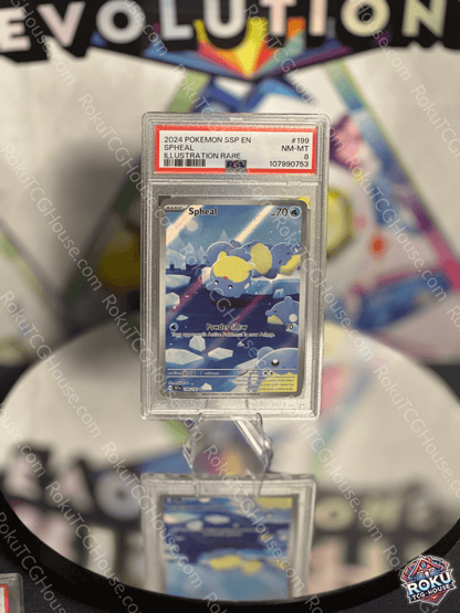 Spheal Pokémon card from Surging Sparks, PSA 8 condition, featuring vibrant artwork and rare illustration details.