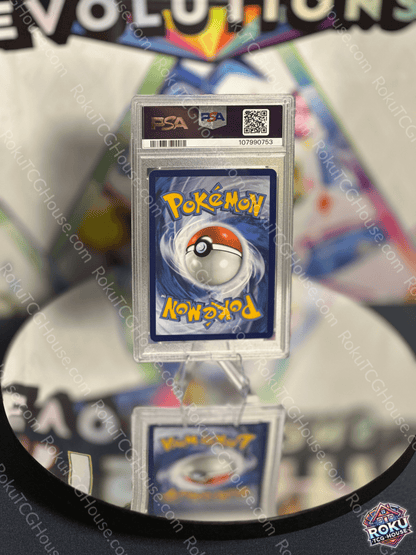 Spheal - Surging Sparks Pokémon Card (PSA 8) displayed on a reflective surface, showcasing its vibrant design.