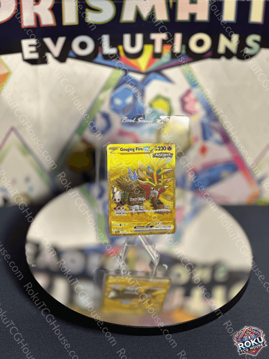 Gouging Fire EX Temporal Forces Pokemon Card displayed on reflective surface with colorful background.