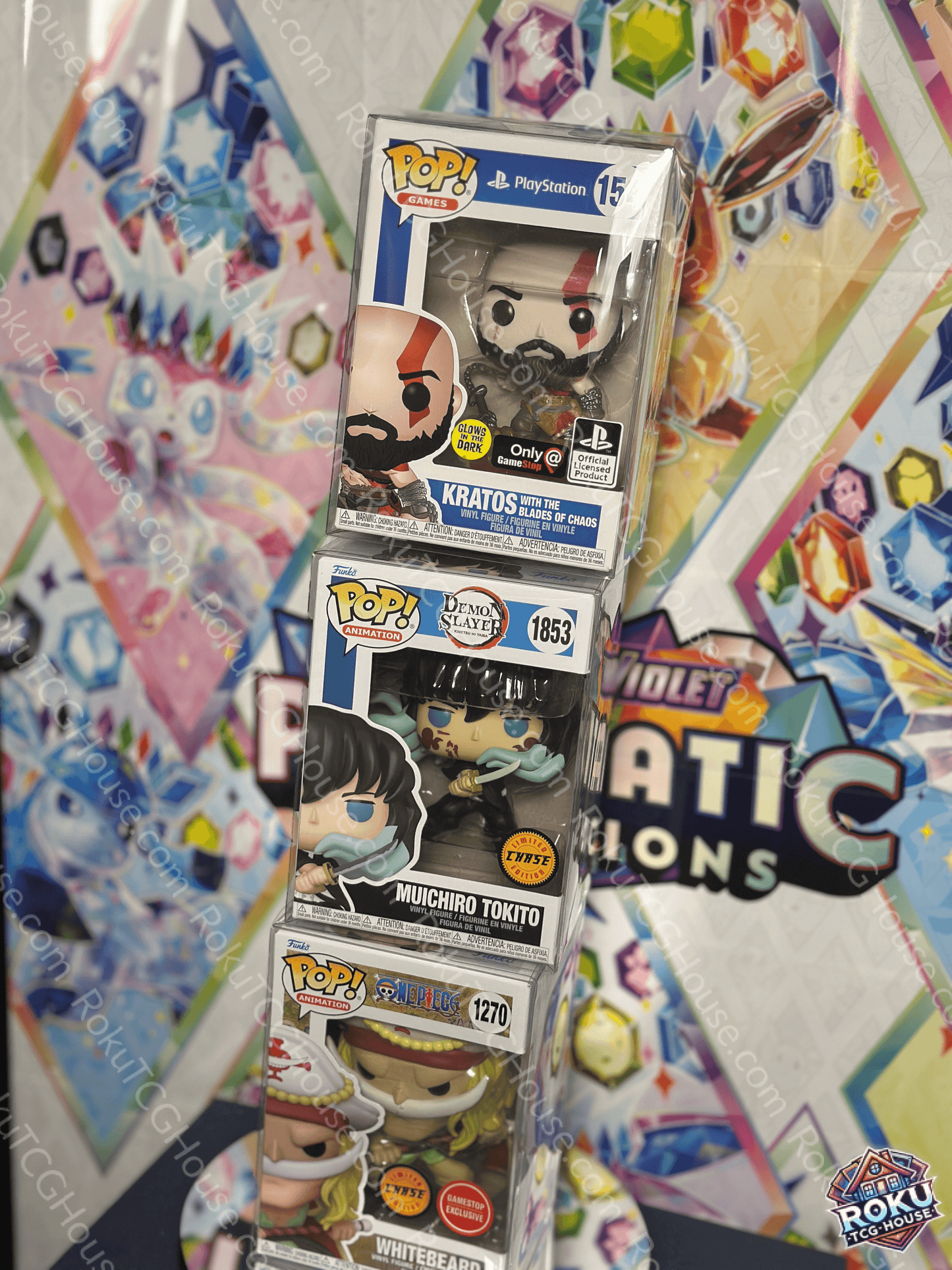 Funko Pop figures displayed in clear vinyl protectors: Kratos, Muichiro Tokito, and Whitebeard with colorful background.