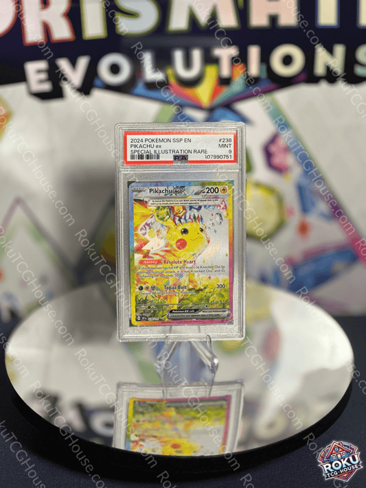 Pikachu EX (238/191) Pokémon card, PSA 9 graded, featuring Surging Sparks illustration on display.