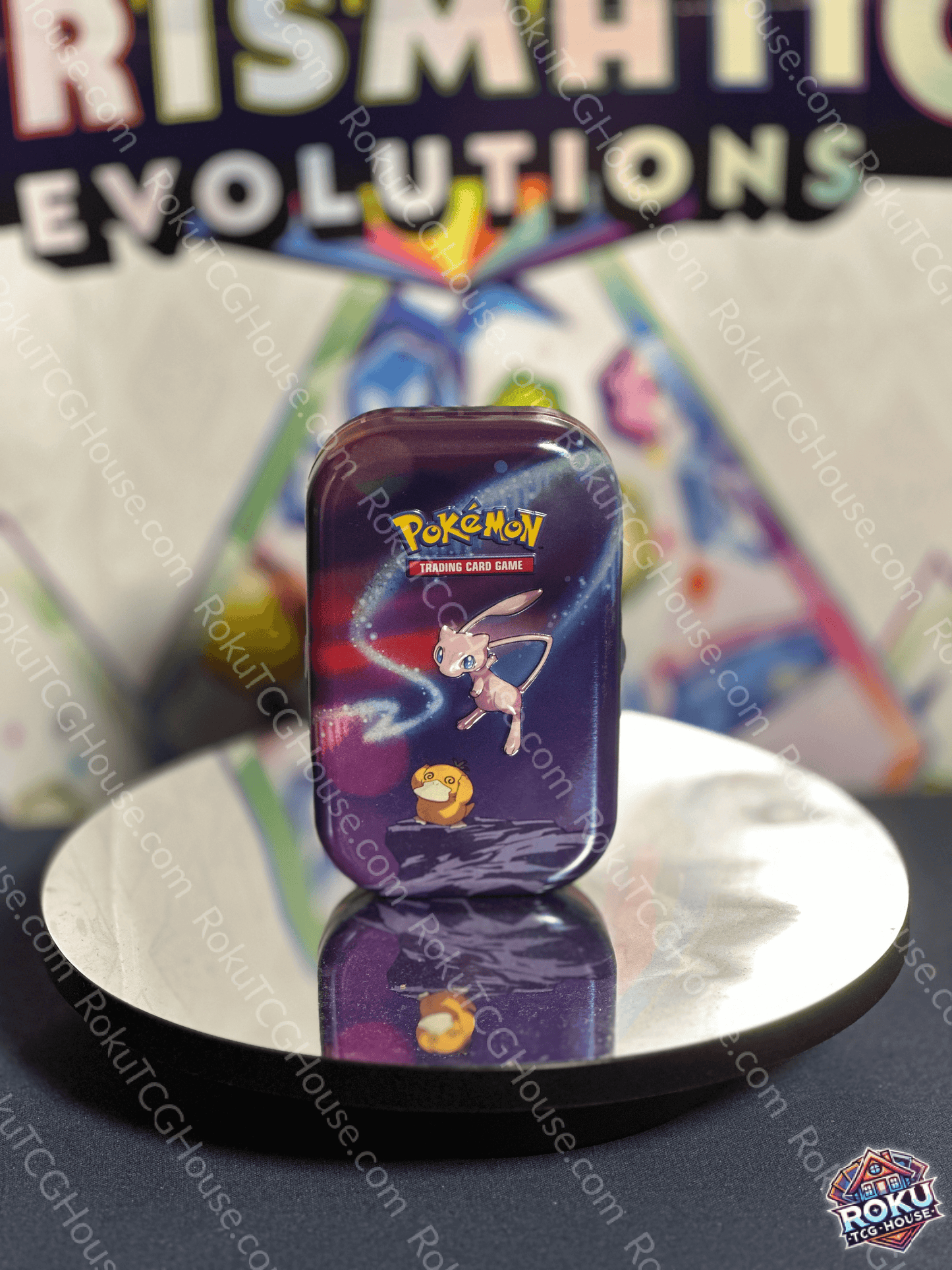 Front of empty Pokémon Storage Mini-Tin featuring Mew artwork on the lid.
