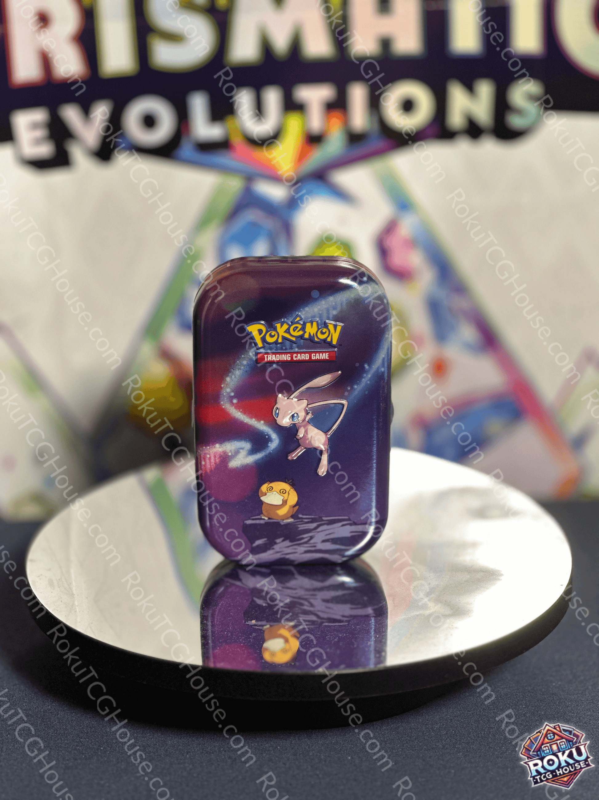 Front of empty Pokémon Storage Mini-Tin featuring Mew artwork on the lid.