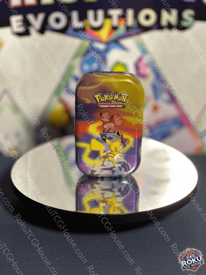 Front of empty Pokémon Storage Mini-Tin featuring Pikachu artwork on the lid.