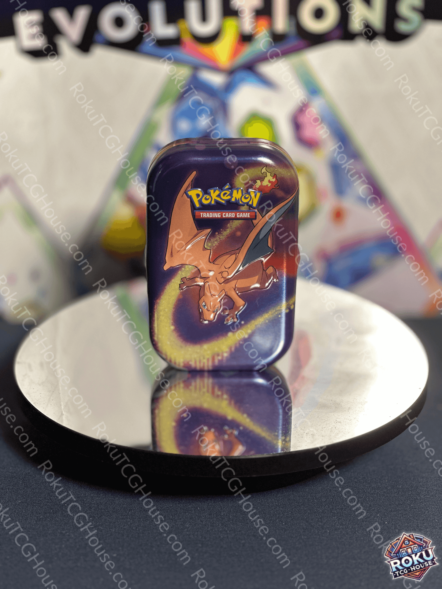 Front of empty Pokémon Storage Mini-Tin featuring Charizard artwork on the lid.