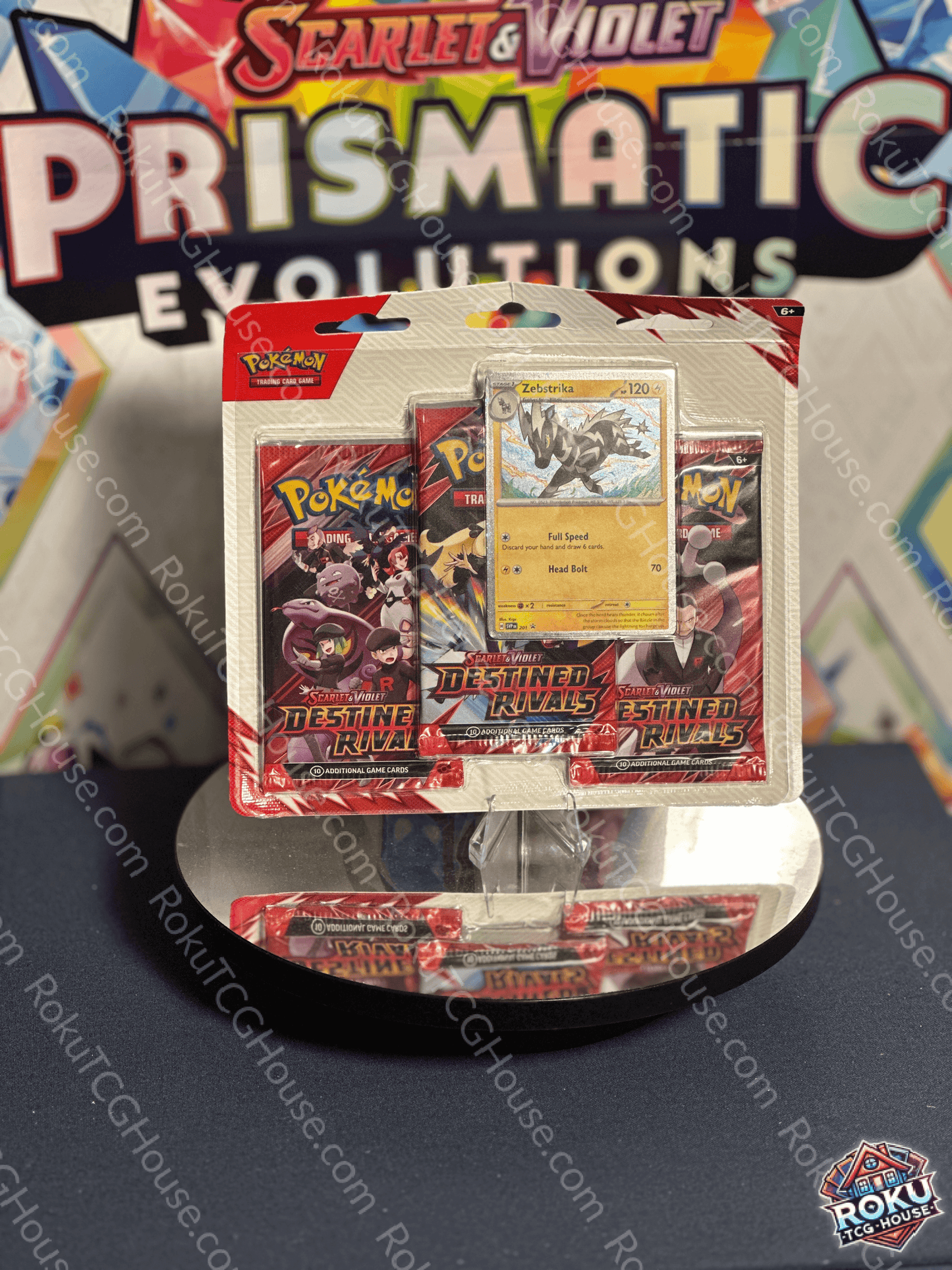 Front of sealed Destined Rivals 3‑pack blister featuring Zebstrika promo card visible through packaging.