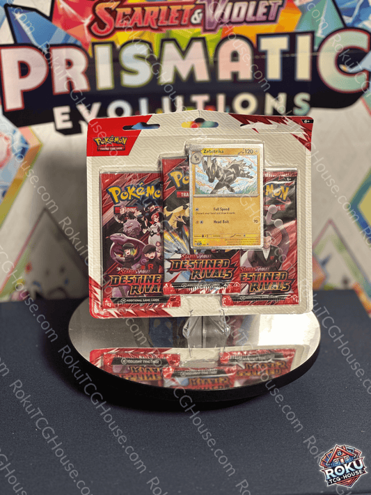 Front of sealed Destined Rivals 3‑pack blister featuring Zebstrika promo card visible through packaging.