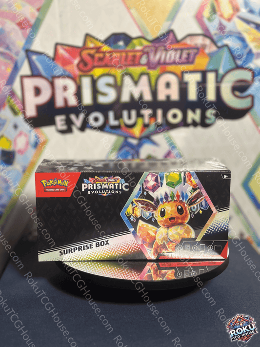 Front of Prismatic Evolutions - Surprise Box showcasing colorful packaging and promotional text
